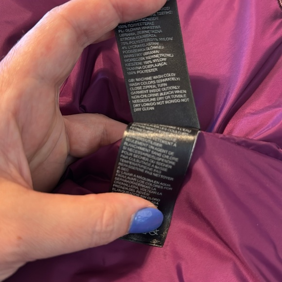 The North Face purple puffer vest, medium - Picture 9 of 9